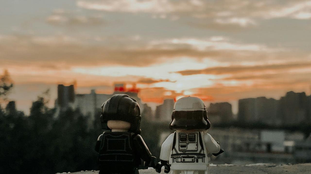 Lego characters looking at sunset