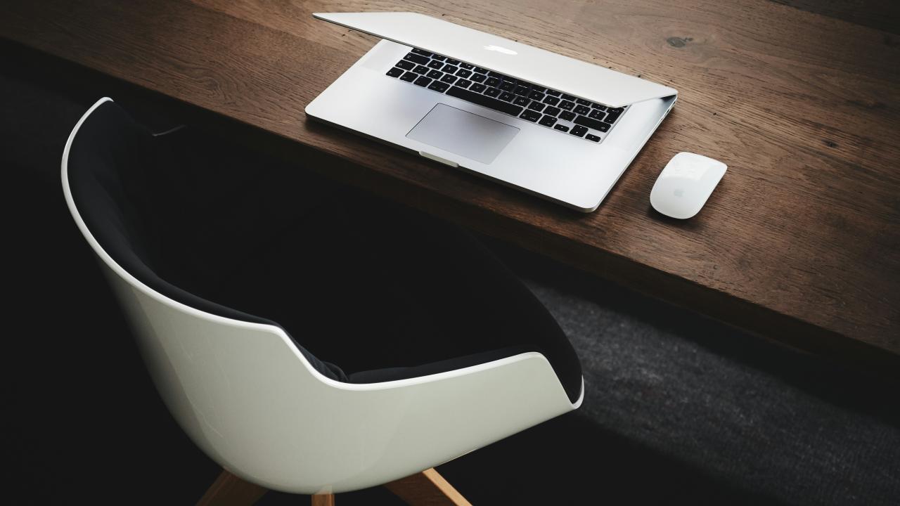 empty chair and laptop