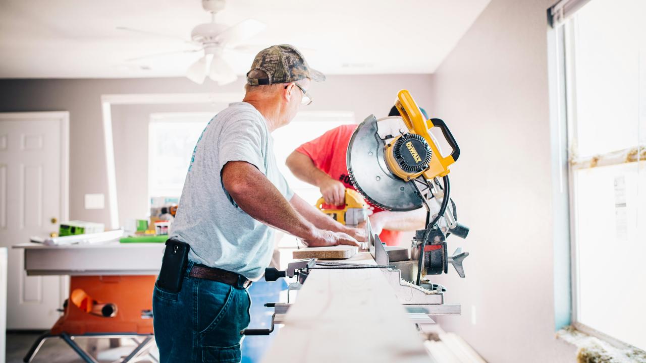 contractors working on kitchen window