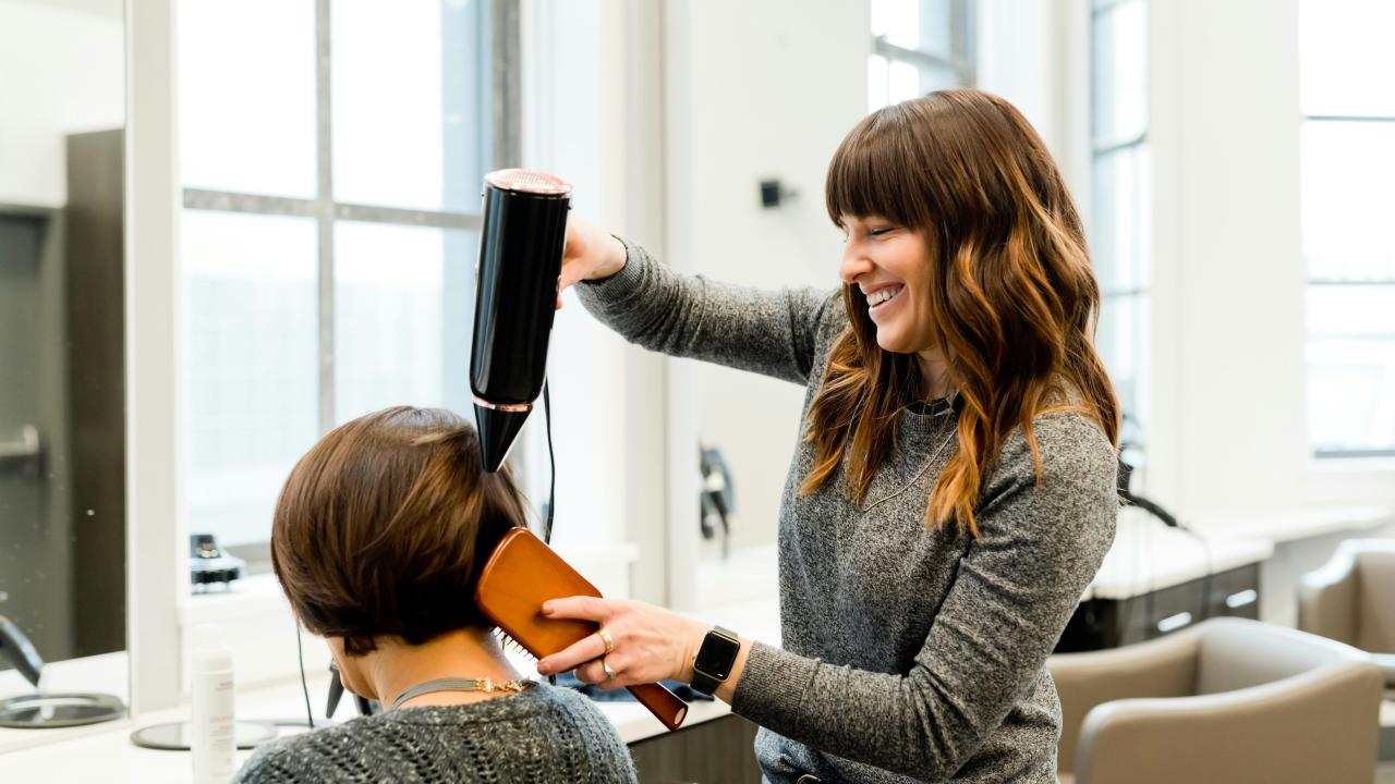 stylist with client