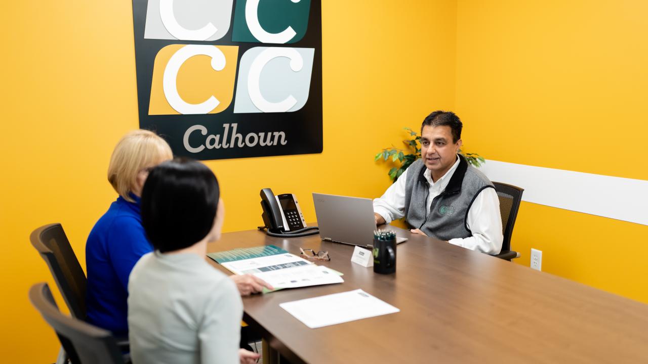 Calhoun Companies agent meeting with a client