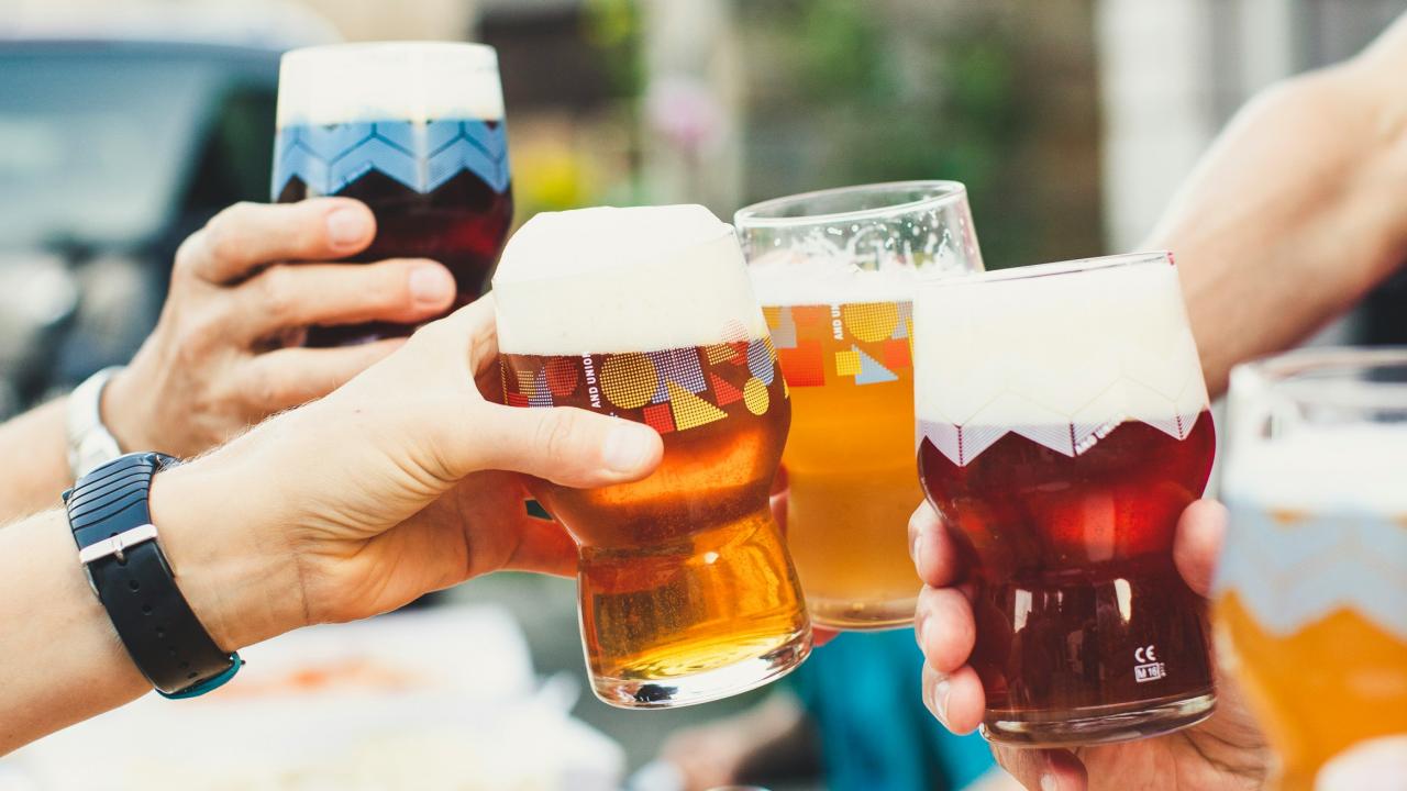 friends toasting with beer