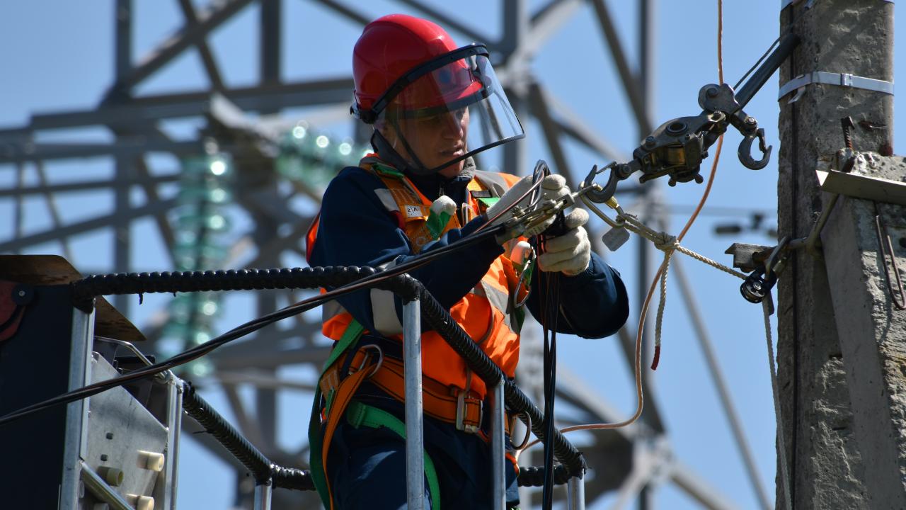electrician working on high wires