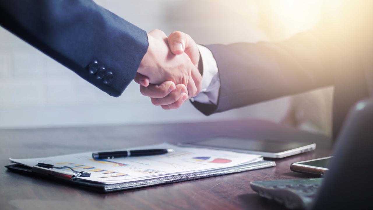 Handshake to close a deal