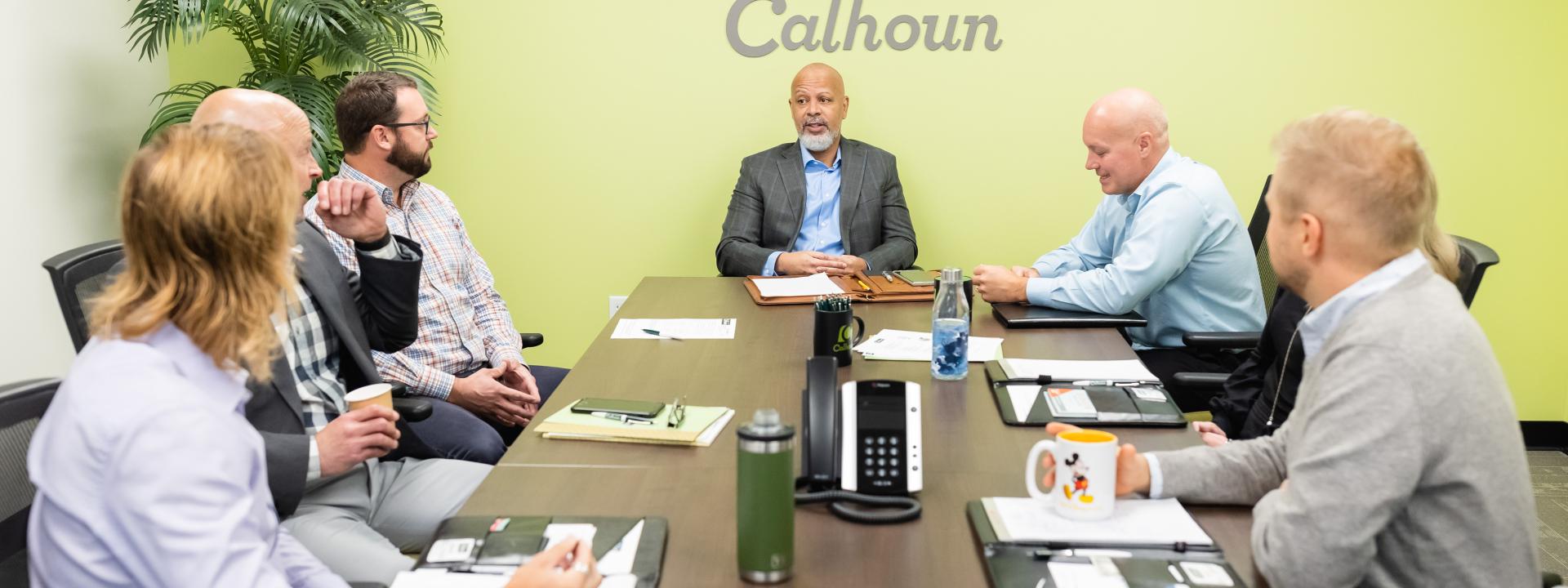 Calhoun Companies agents in a meeting