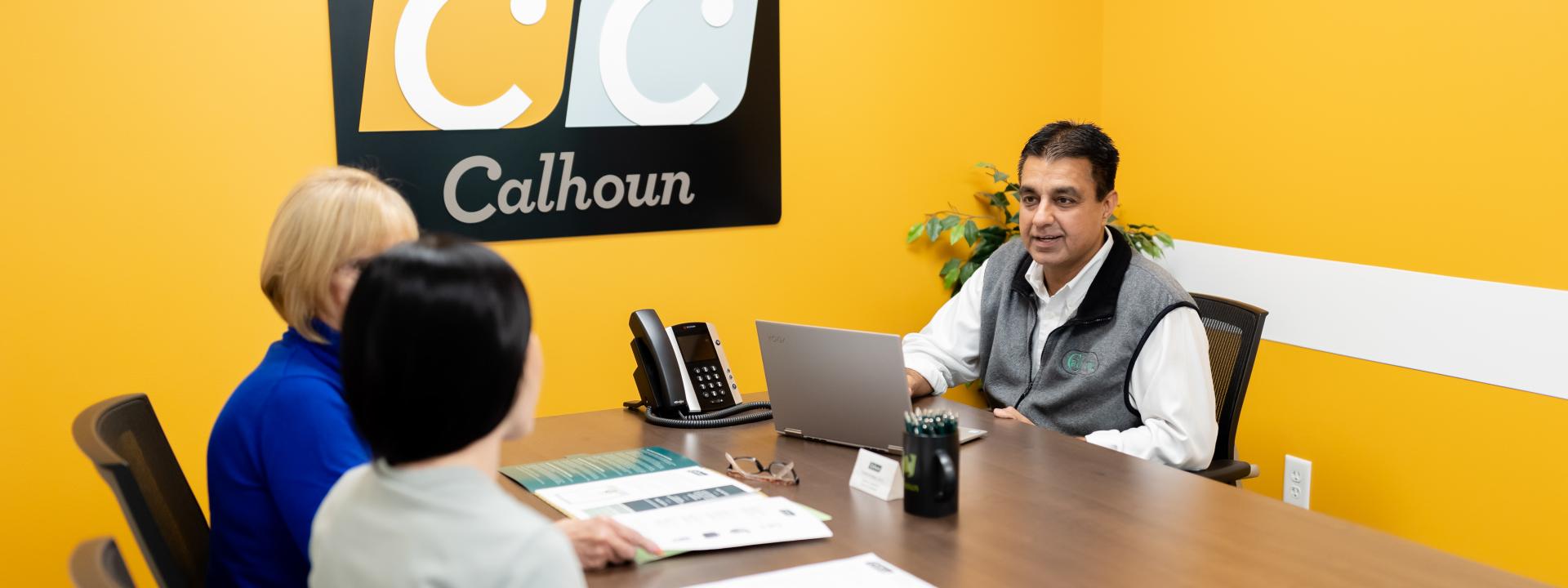 Calhoun Companies agent meeting with a client