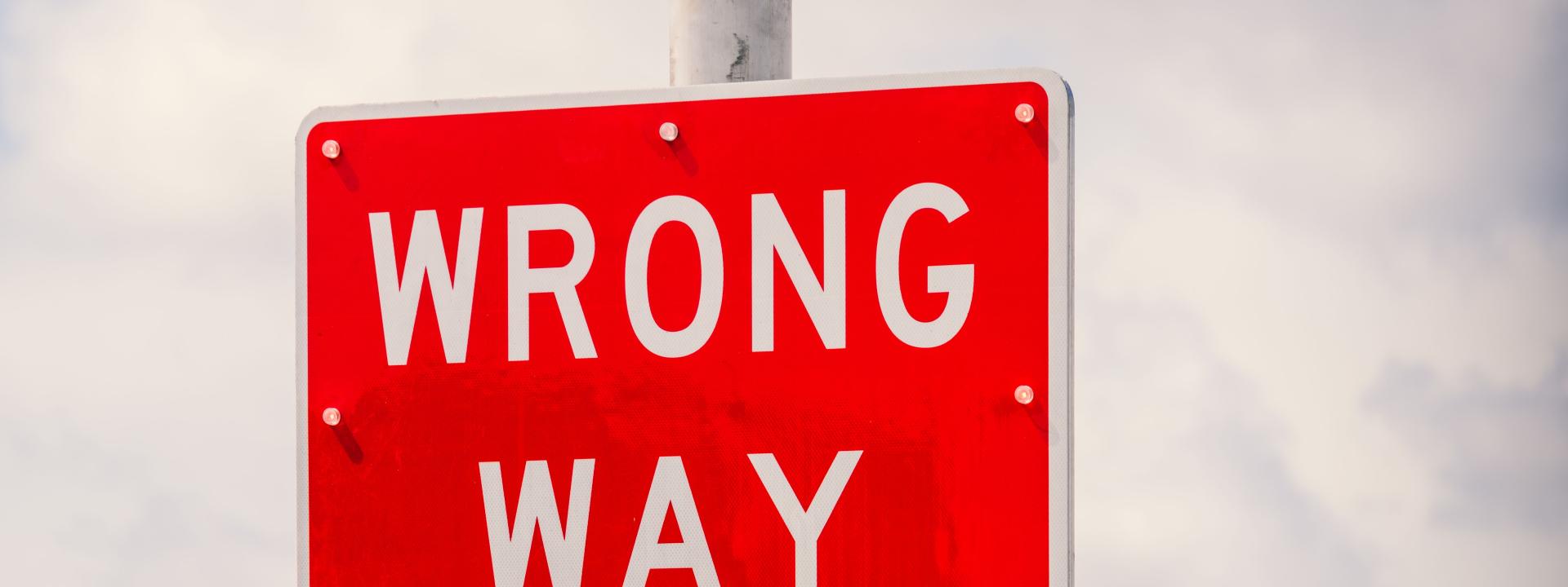 Wrong way street sign