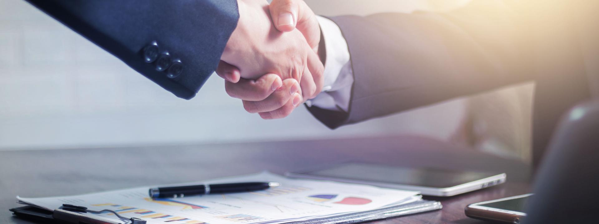 Handshake to close a deal