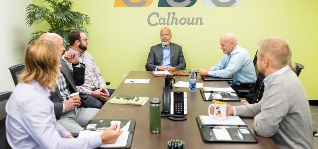 Calhoun Companies agents in a meeting