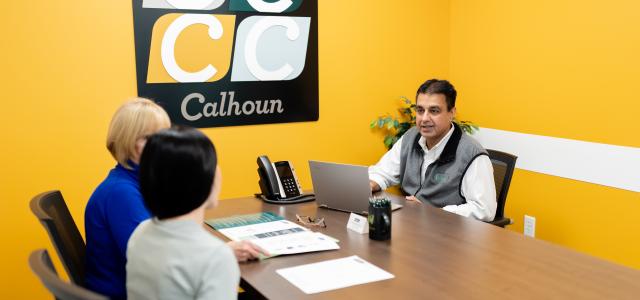 Calhoun Companies agent meeting with a client