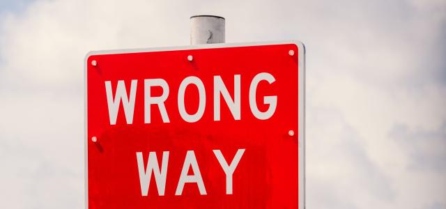 Wrong way street sign
