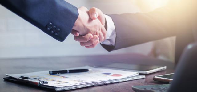 Handshake to close a deal